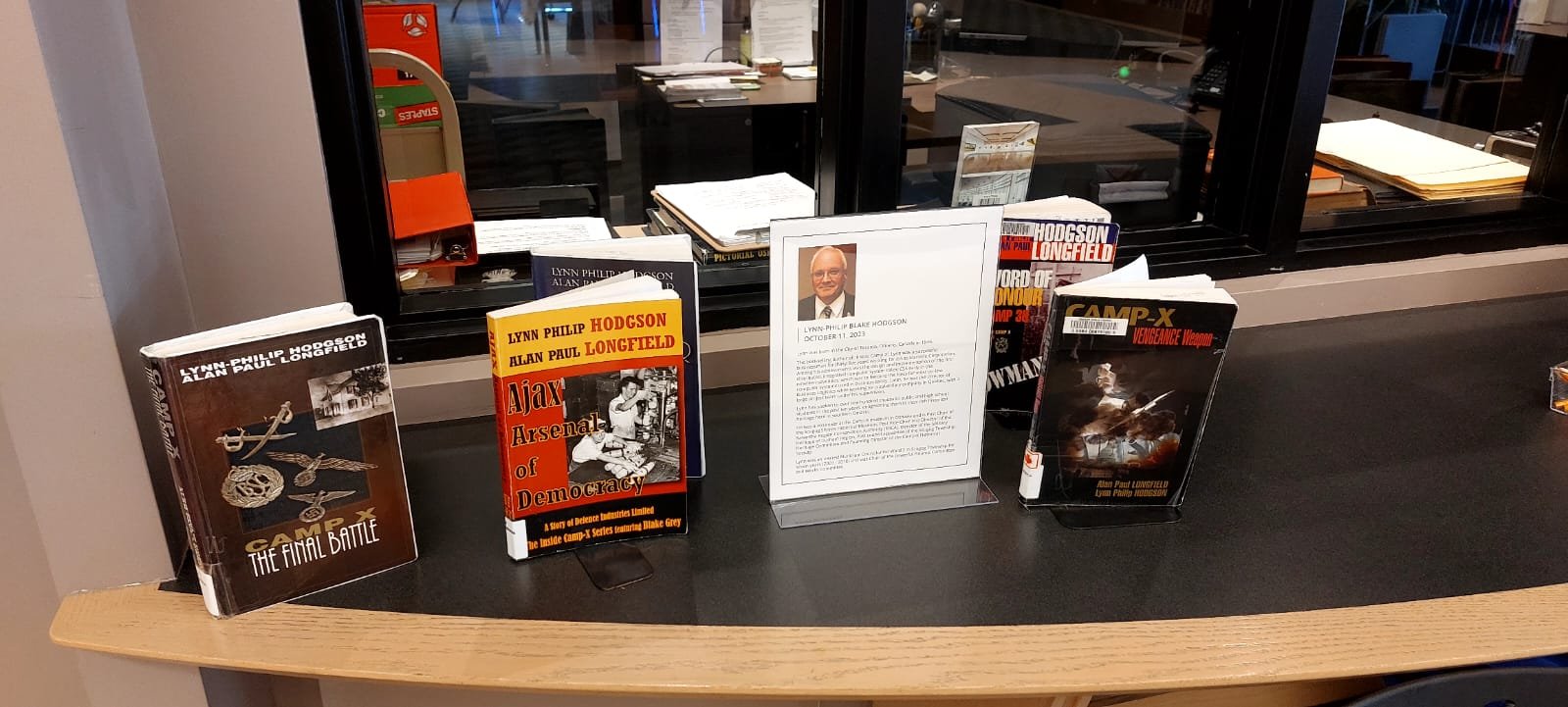 Camp X history books on a library display
