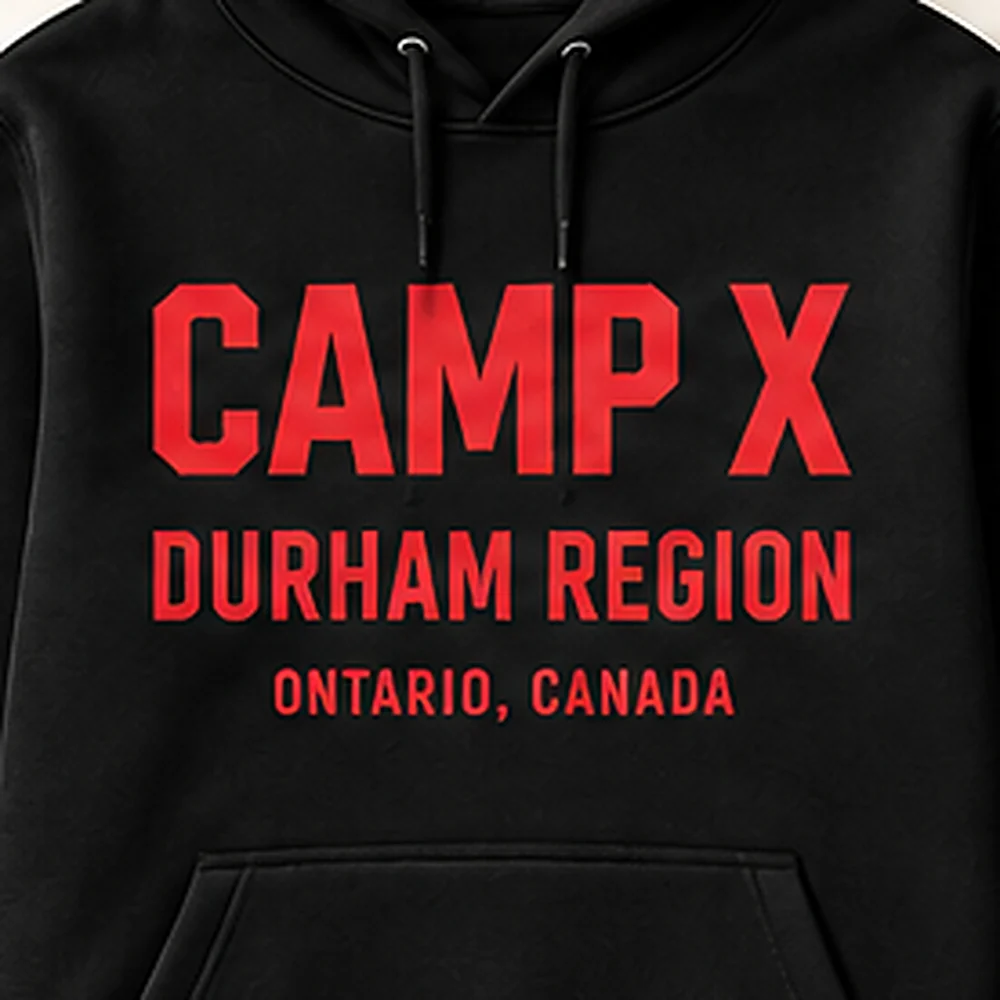 Close-up of the red CAMP X Durham Region print on the Camp X Durham Region Red Print Hoodie