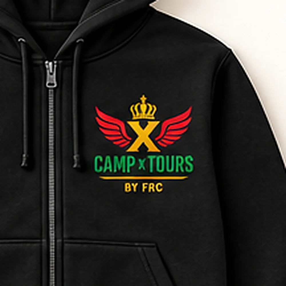 Close-up of the Camp X Tours by FRC emblem print on the chest of the Camp X Tours by FRC Cotton Tracksuit zip-up hoodie